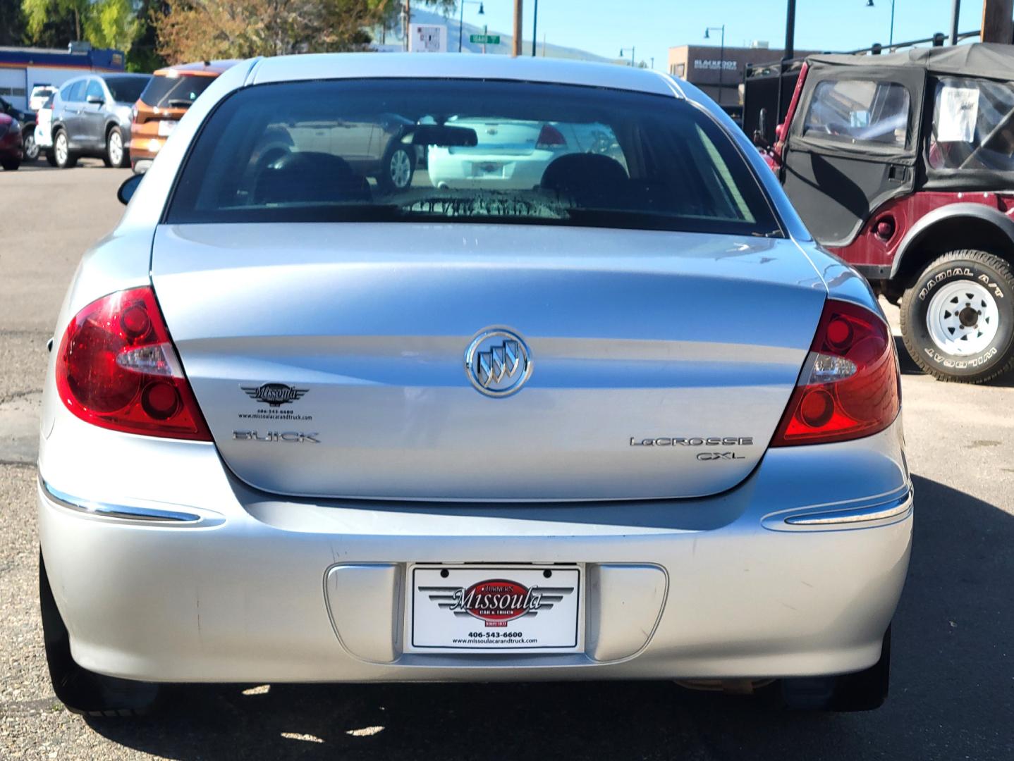 2009 Silver /Black Buick LaCrosse (2G4WD582091) with an 3.8L V6 engine, 5 Speed Automatic transmission, located at 450 N Russell, Missoula, MT, 59801, (406) 543-6600, 46.874496, -114.017433 - Photo#4